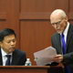Don West, right, questioning Dr. Shiping Bao (Getty Images)